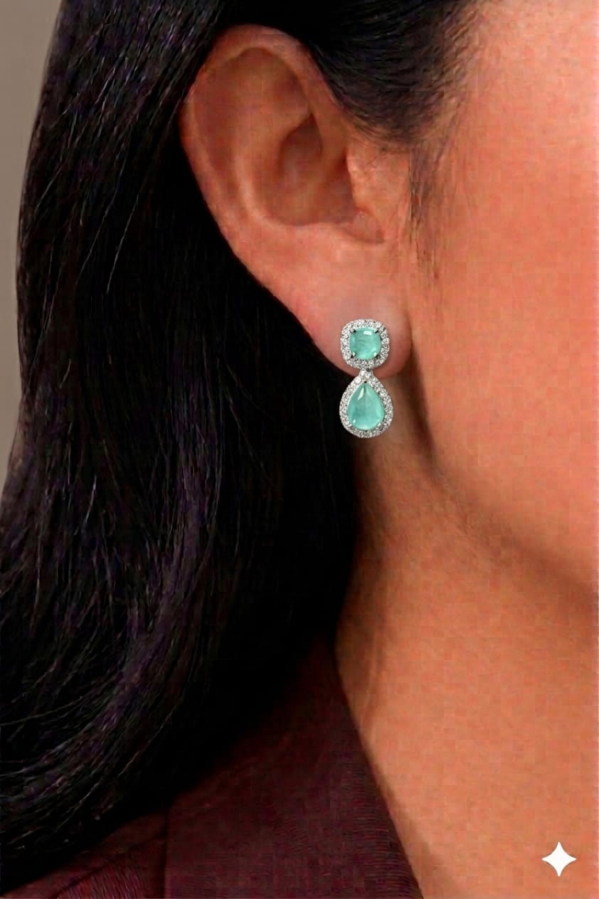 Light blue doublet earrings.